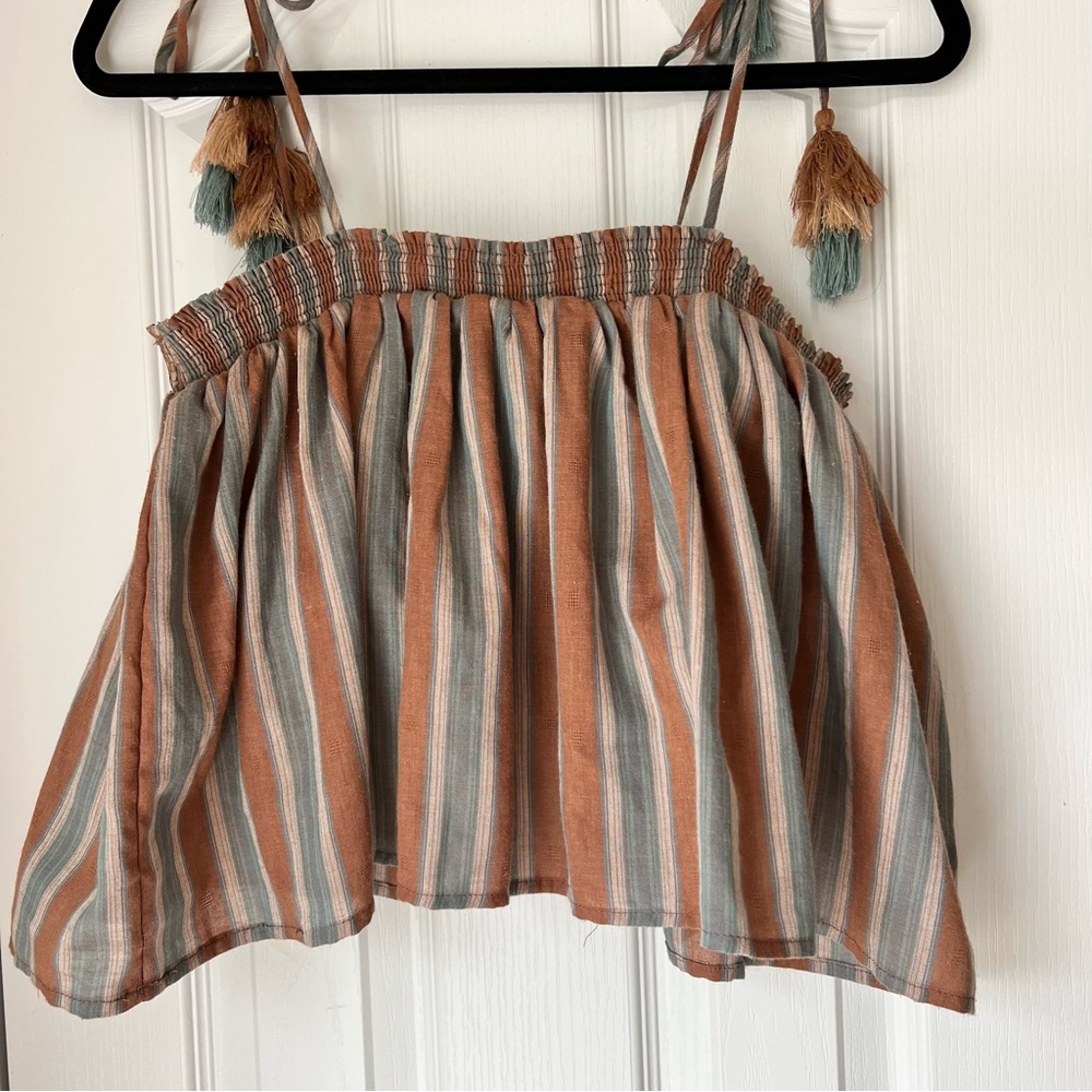 Vestique Shoulder Tie Flowy Crop with Tassels